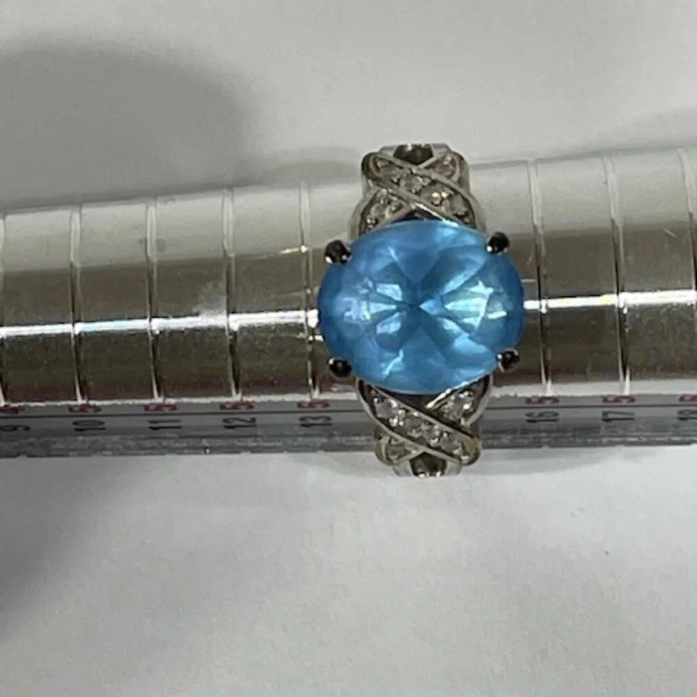 Blue topaz and silver ring.